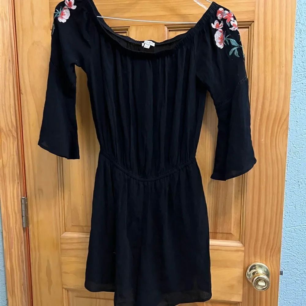 Love Fire size medium black romper with floral embroidery on sleeves